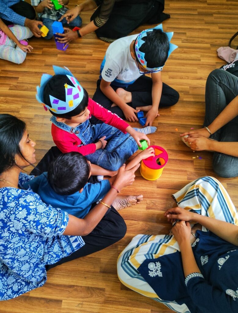 Child psychologist counselling a teenager during a behavioral therapy and emotional support session at home in Bangalore.